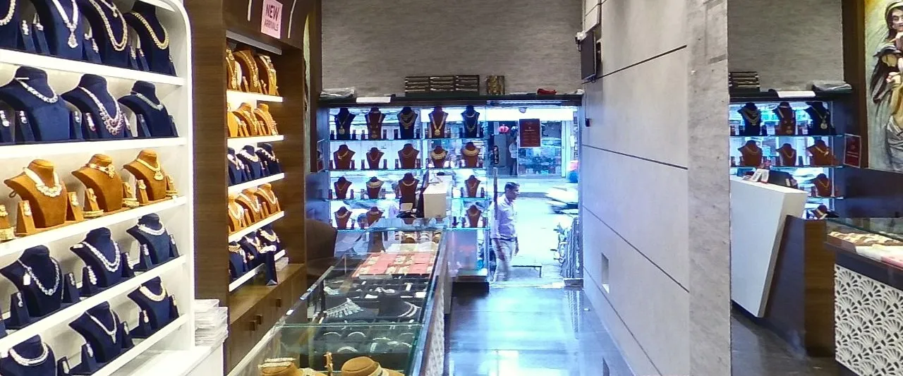 A sample jewellery store: necklace walls and the counter