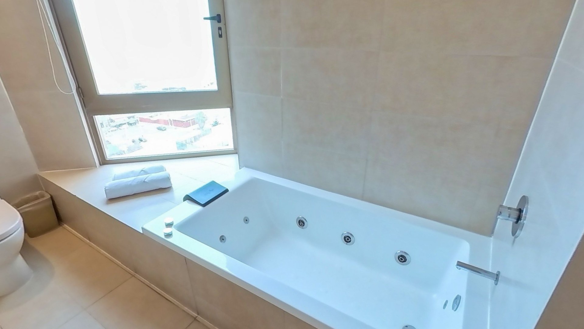 The Premium suite's bathroom, turning to the jet bathtub under the window